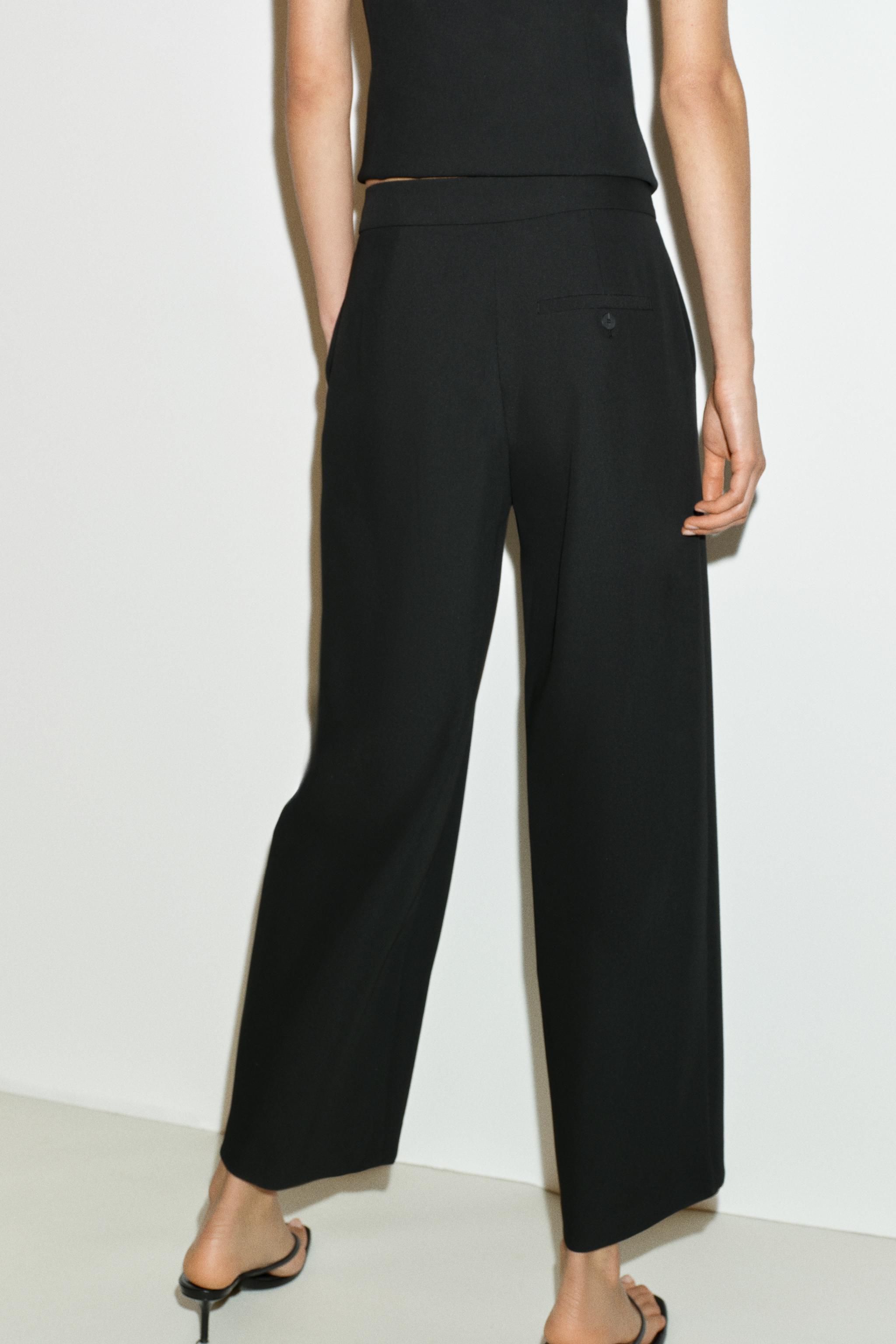 PLEATED TAPERED PANTS